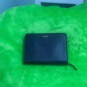 Lodis Kate Mini Zip Round Pebbled Leather RFID Wallet